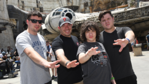 Family in front of Millenium Falcon