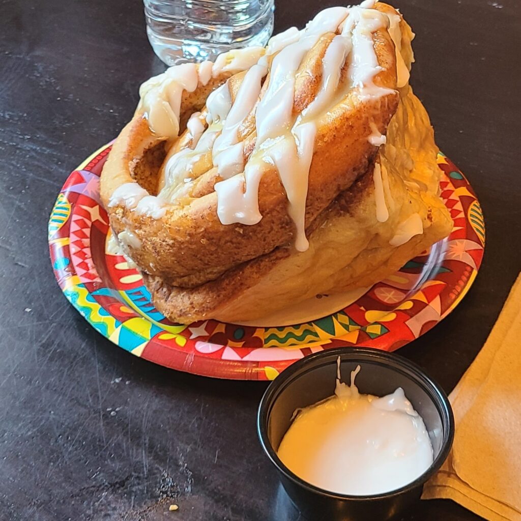 Cinnamon Roll.  Share snacks to stay within your Disney World Budget