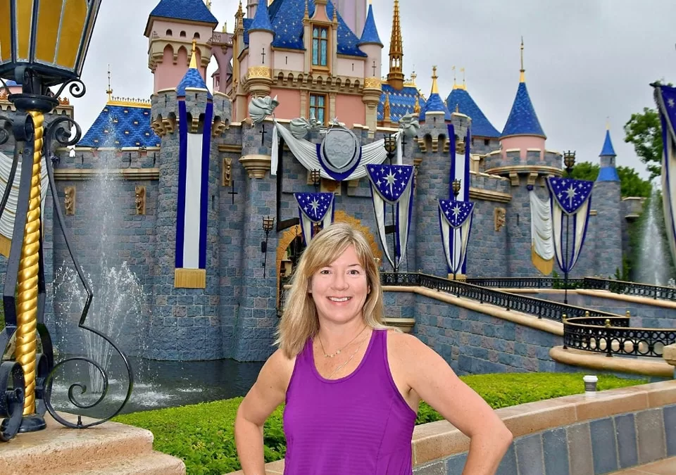 Jessica Yashin in front of Sleeping Beauty Castle at Disneyland