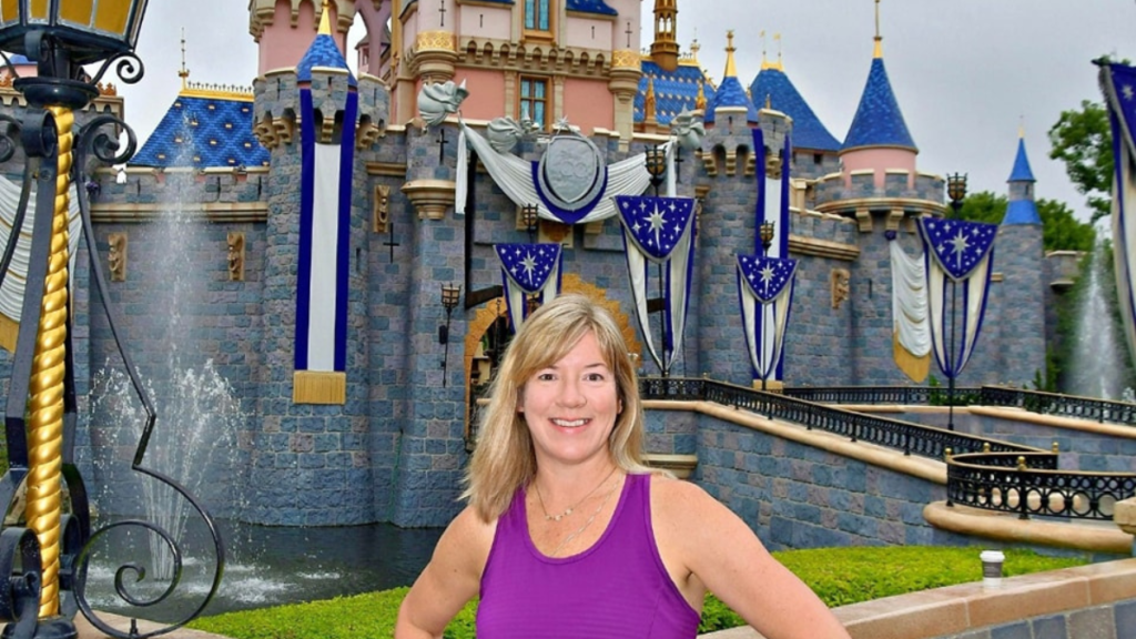 Jessica Yashin in front of Sleeping Beauty Castle